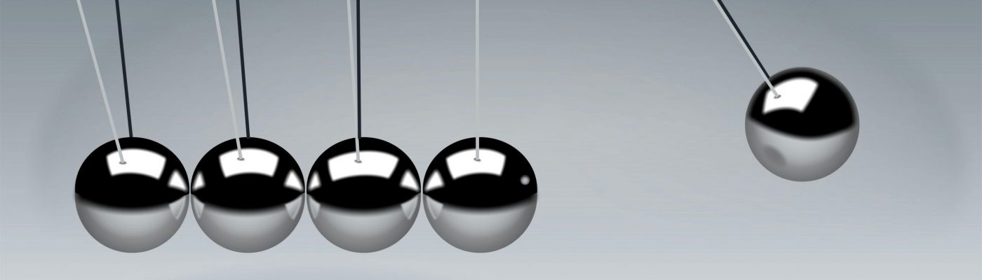 Dynamic illustration of Newton's Cradle showing motion and reflection concepts in physics.